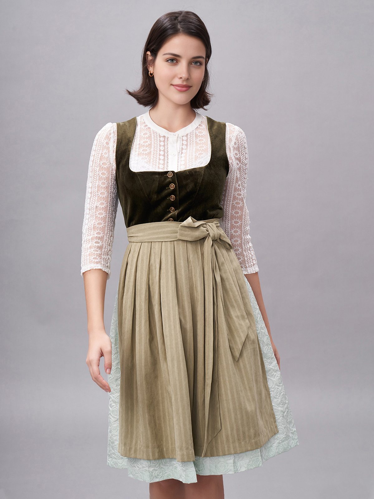 Ein grünes Dirndl mit traditionellem Schnitt