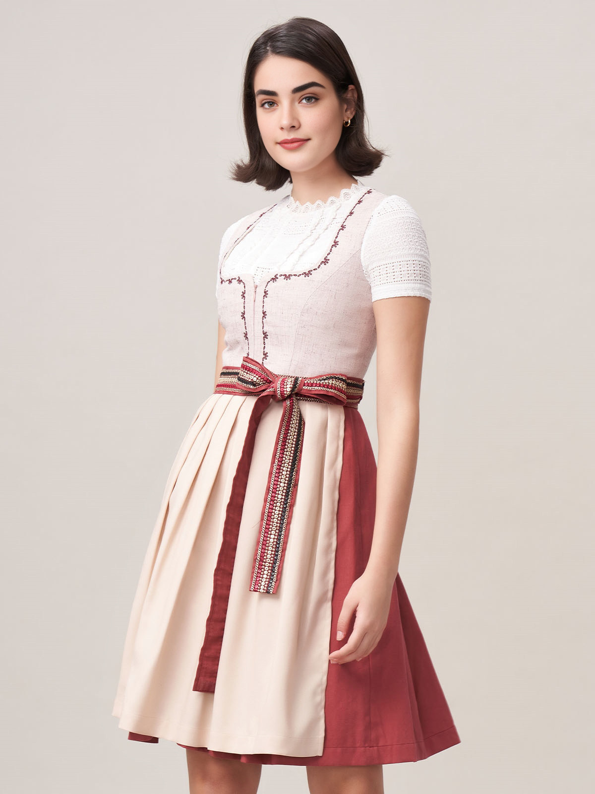 Ein rosa Dirndl mit floralen Details – perfekt für festliche Anlässe